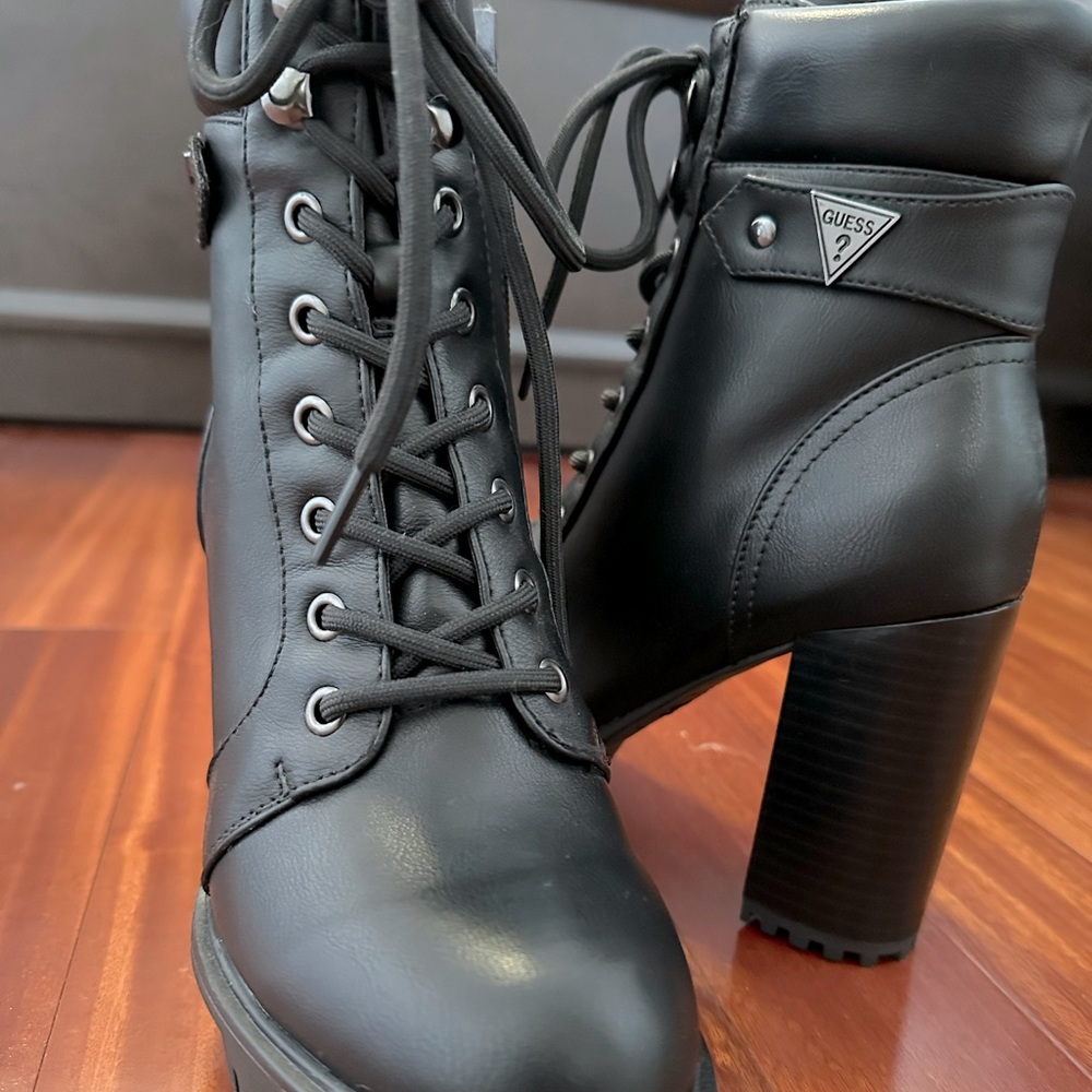 Black Guess boots . never worn
